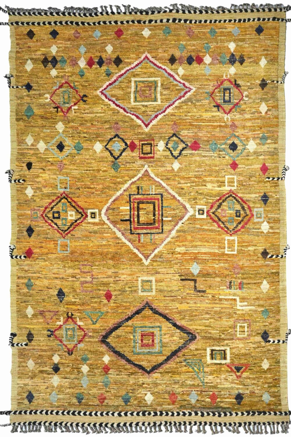 Moroccan rug rectangular yellow-toned woven rug featuring bold geometric patterns in red, blue, green, and white. The design includes diamonds, small motifs, and braided black-and-white tassels on the edges.