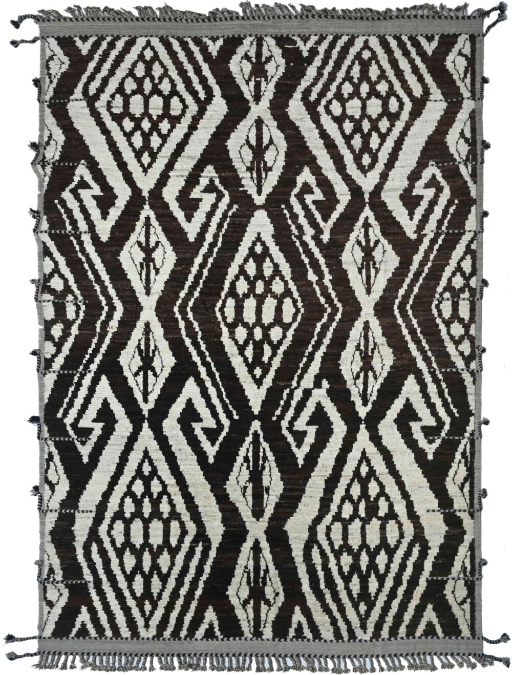 Transform your home with this striking 13' x 10' Moroccan rug, showcasing bold tribal patterns in rich brown and cream tones for a dramatic centerpiece