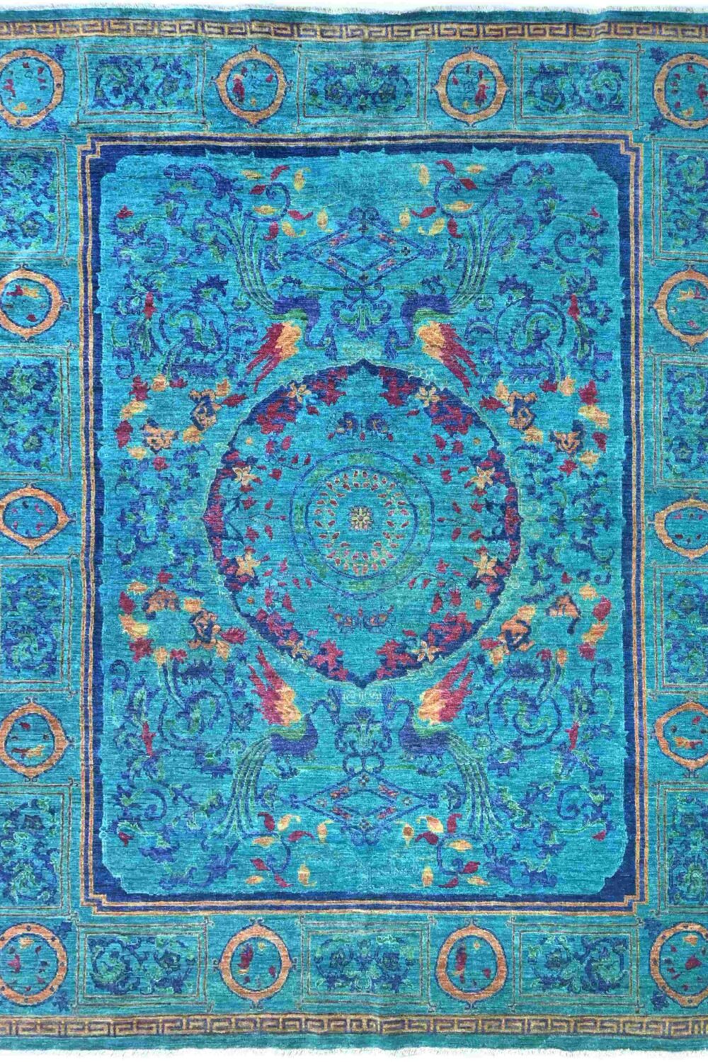 Vibrant blue Chobi rug with intricate floral and bird motifs, measuring 10' x 8', perfect for adding a touch of elegance to a living room.