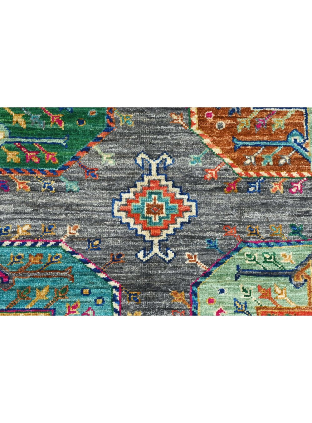 Colorful Ensari rug, size 6' x 4', featuring intricate geometric patterns and vibrant octagonal medallions, perfect for adding a touch of elegance to a living room