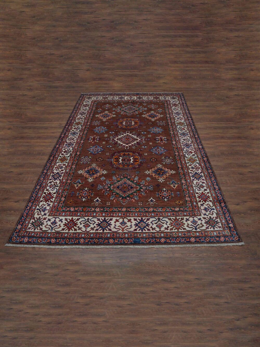 Supper kazzak 6 x 8 brown area rug showcasing geometric floral patterns in rich tones of blue, red, and ivory, bordered by intricate white accents featuring traditional motifs."