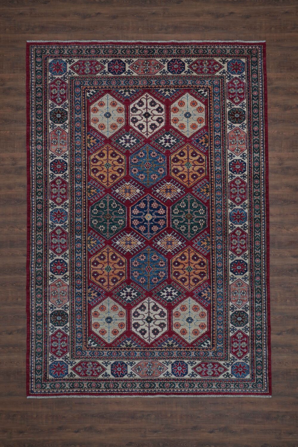 Super kazzak 5 x 8 Vibrant rectangular rug with octagonal patterns, floral motifs, rich colors, and intricate borders, perfect for enhancing traditional home decor.